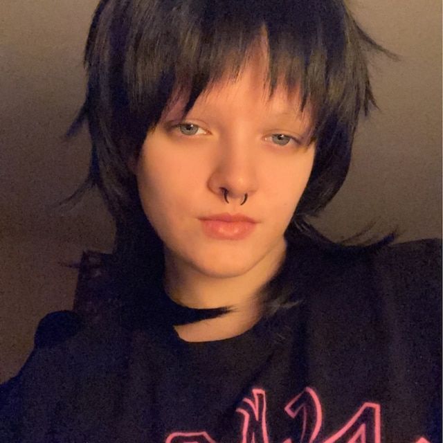 Customer photo review of Men Black Long Straight Fringe Bangs Layered Mullet Cosplay Wig