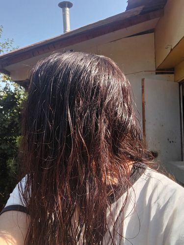 Reseña con foto de un cliente sobre Henna Jamila Hair