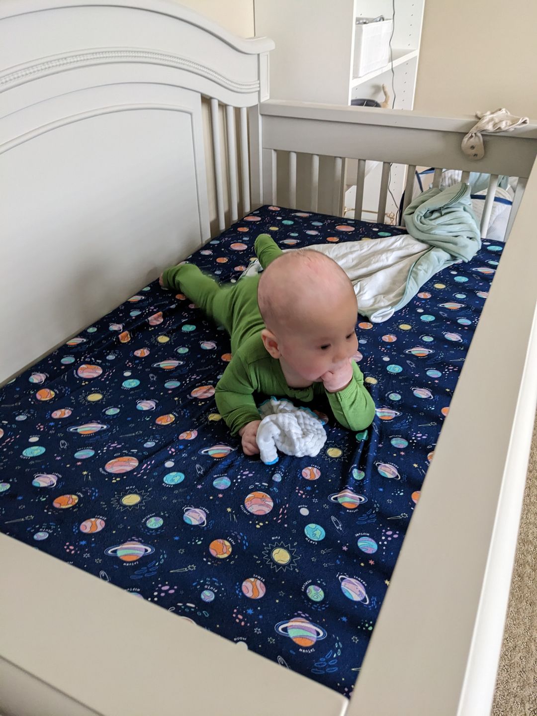 Customer photo review of Planets Bamboo Crib Sheet