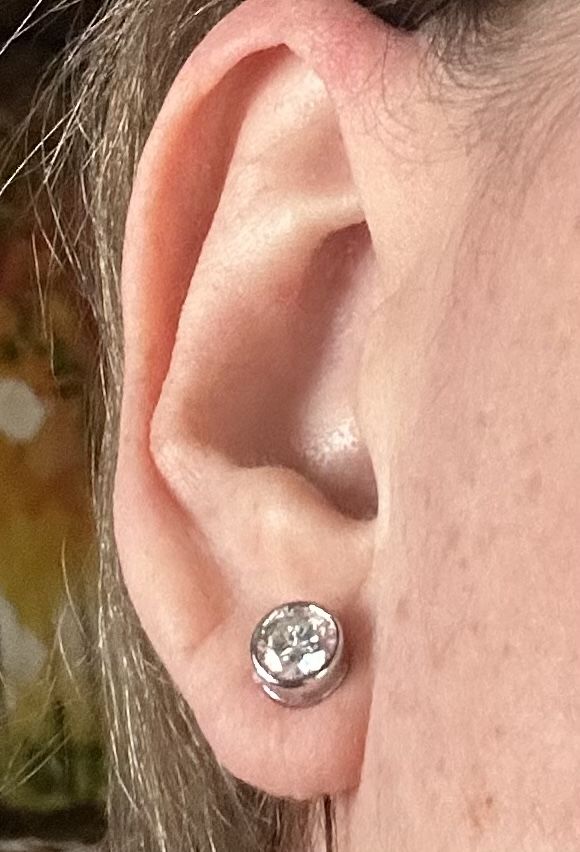 Customer photo review of Round Moissanite Bezel Set Sterling Silver Earrings