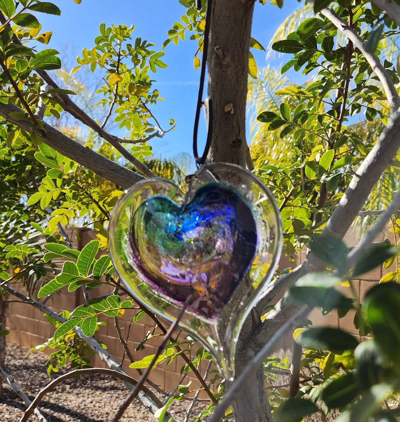 Customer photo review of Dichroic Heart Suncatcher with Infused Cremains