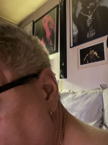 Customer photo review of Ouroboros Earrings