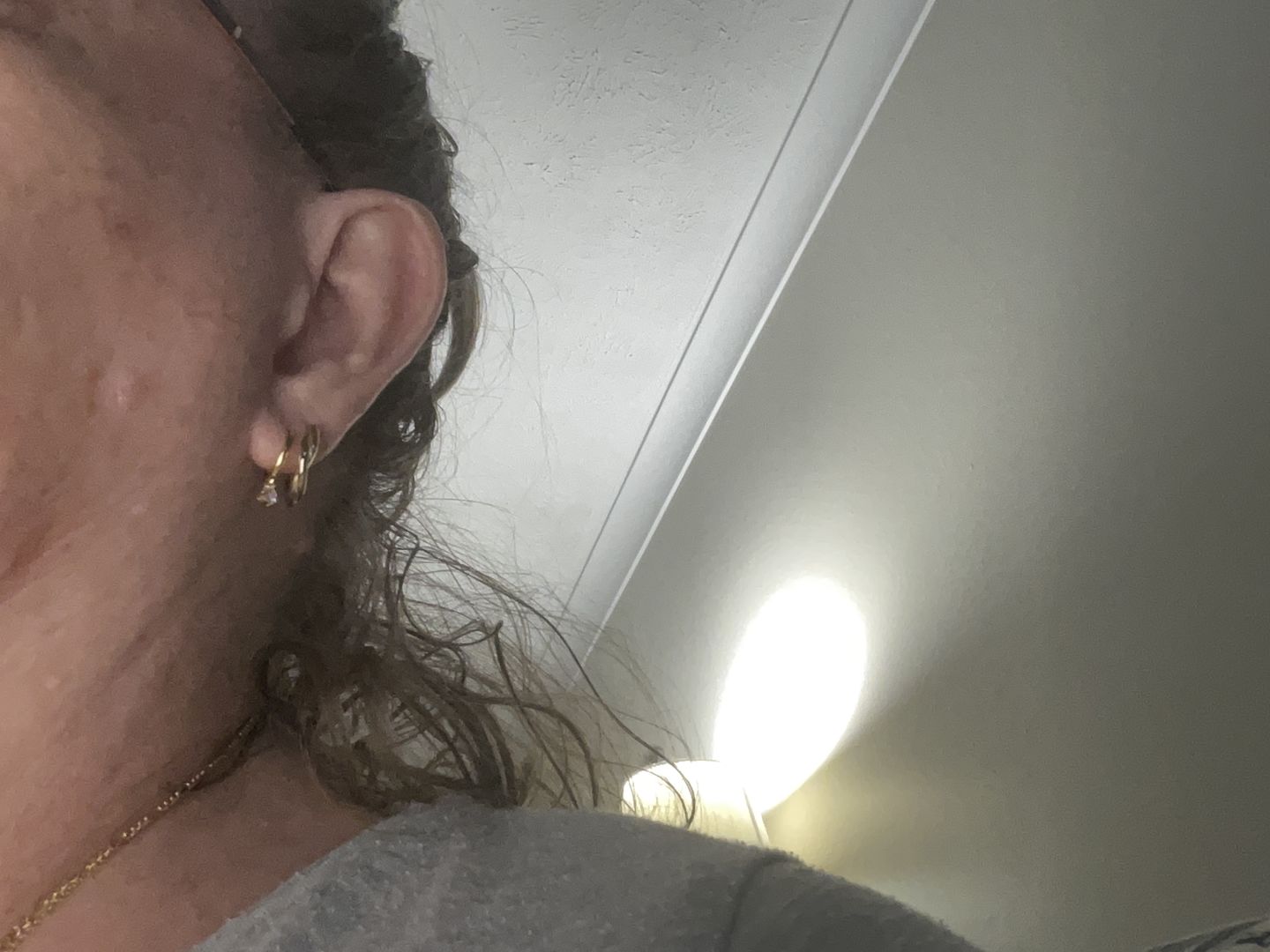 Customer photo review of Solitaire Hoop Huggie Earrings