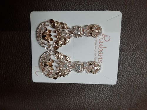 Customer photo review of Rubans Zircon Studded Handcrafted Rose Gold Plated Filligree Floral Drop Earrings