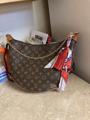 Customer photo review of NEW Twilly Silk & Leather Tassel Keychain 13”