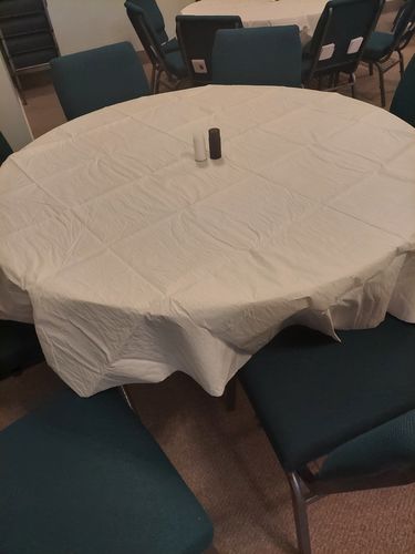 Customer photo review of 82 inch Octy Round Tissue/Poly Tablecover White