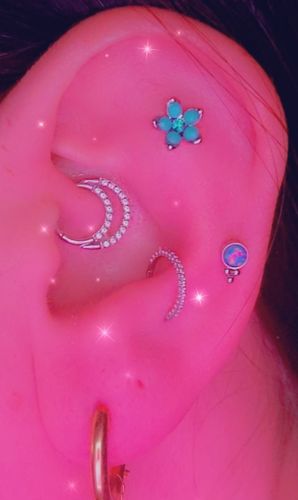 Customer photo review of Flower Cartilage and Tragus Ring with Opalite Petals