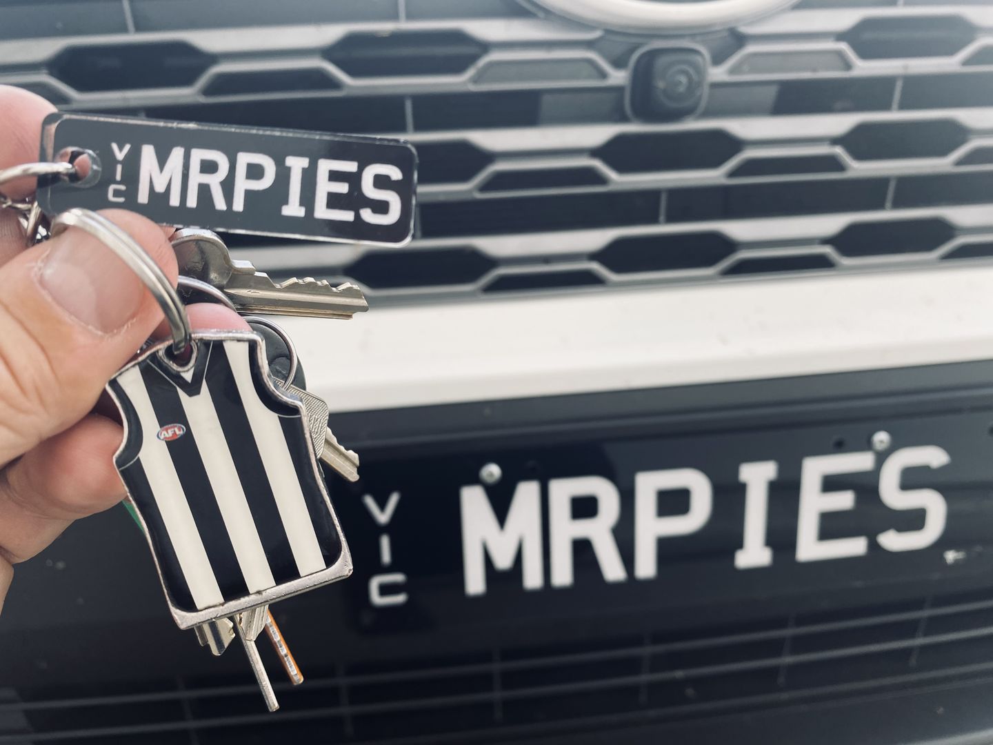 Customer photo review of VIC Deluxe Licence Plate Custom Keychain
