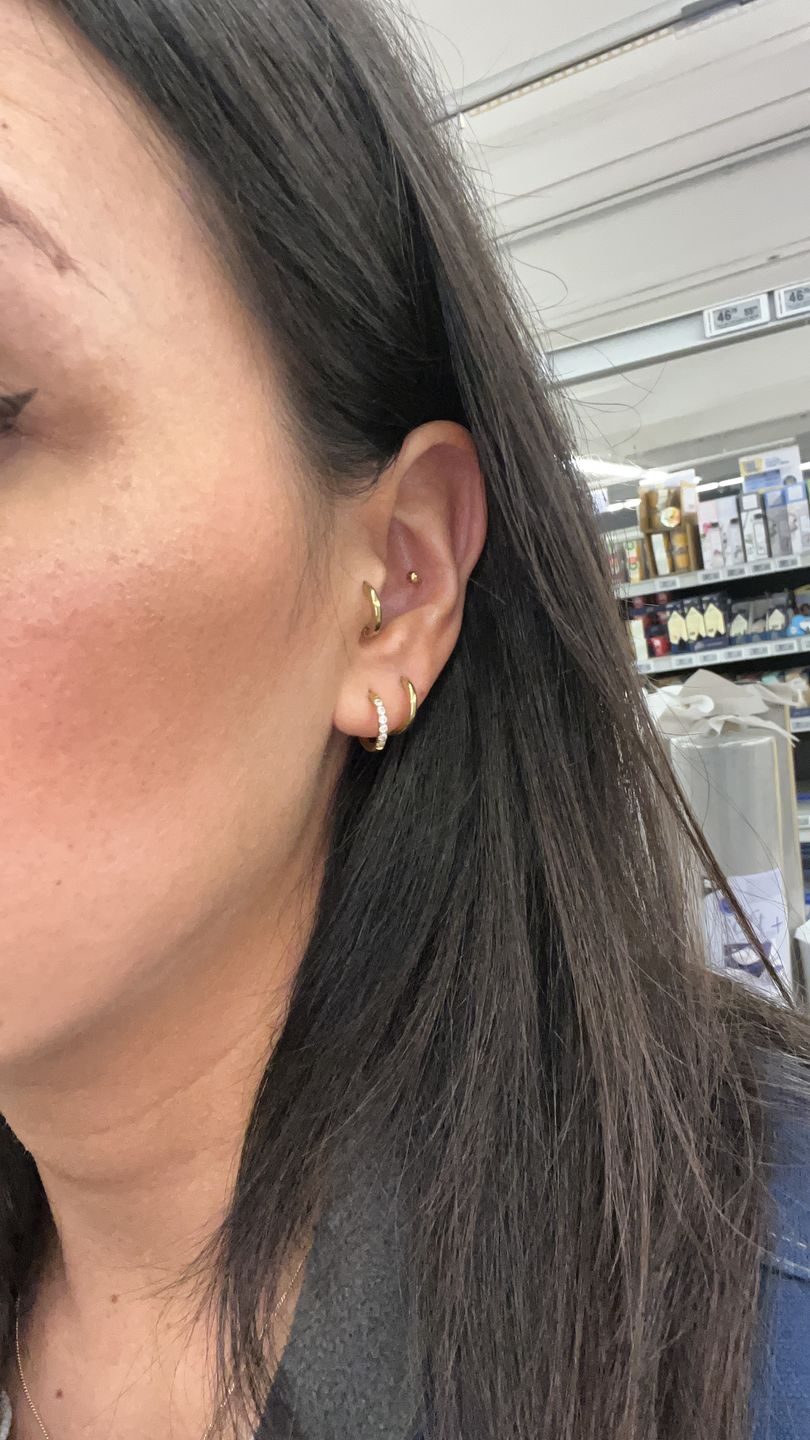 Customer photo review of Simple Dot Piercing | Titan