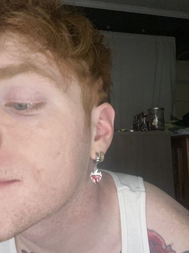 Customer photo review of Mister Flaming Heart Earring