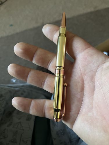 Customer photo review of .308 Real Bullet Authentic Brass Casing Refillable Twist Pen - Tactical Gift Box - Polished Brass