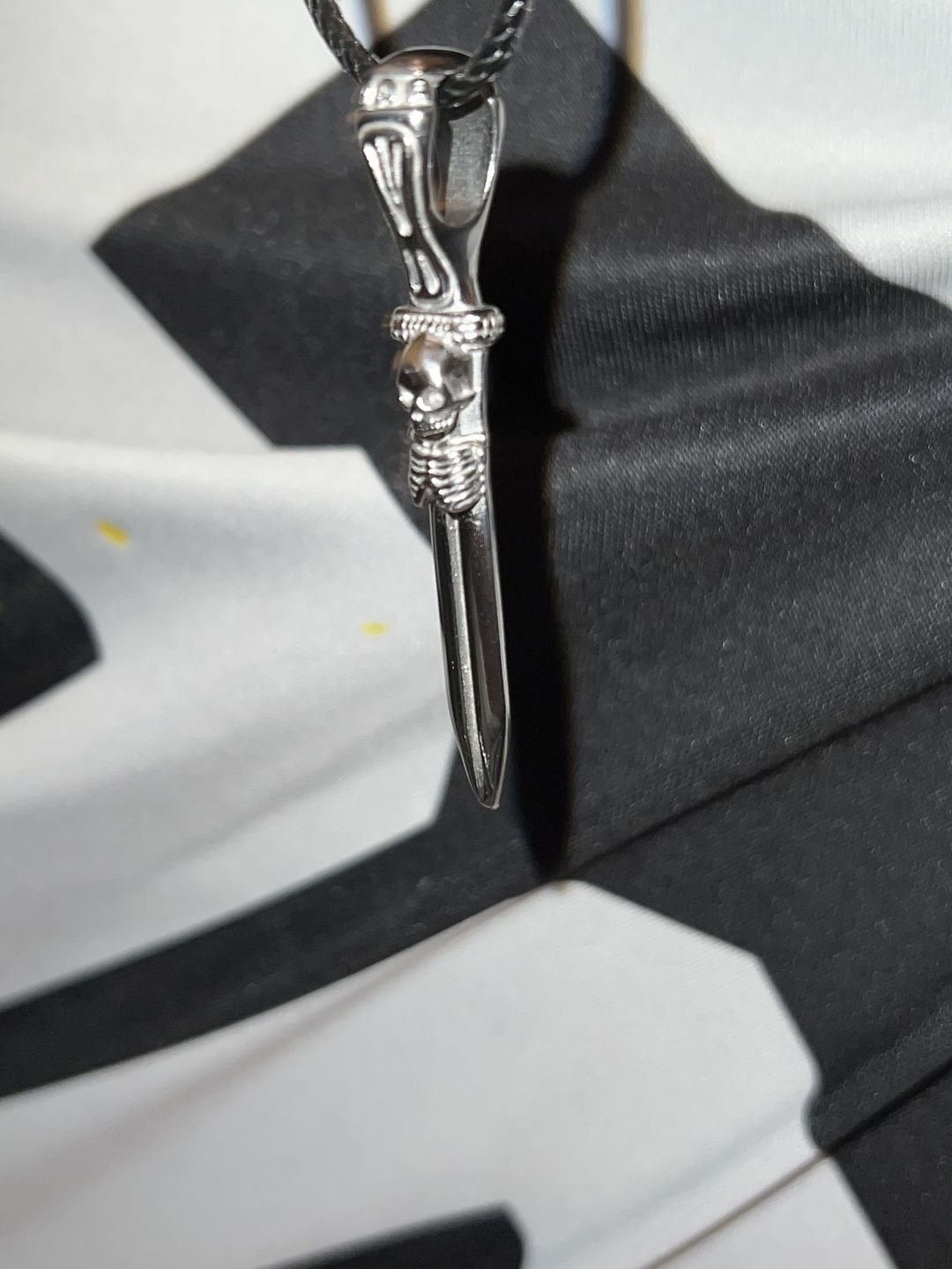 Customer photo review of CATACOMB SWORD PENDANT (NEW)