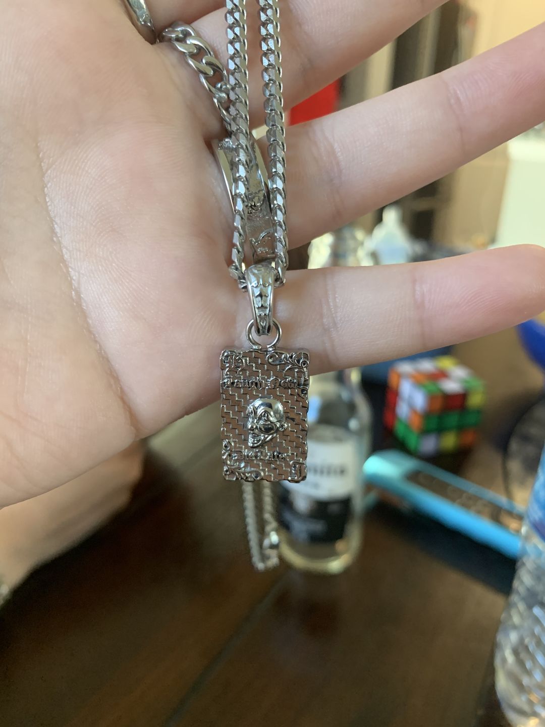 Customer photo review of LAUGH NOW, DIE LATER PENDANT