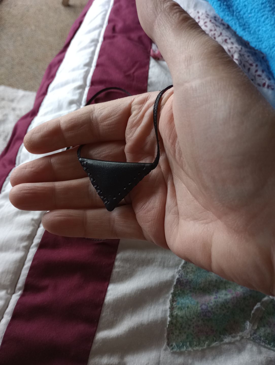 Customer photo review of Naqshbandi Taweez Necklace from Shaykh Nazim