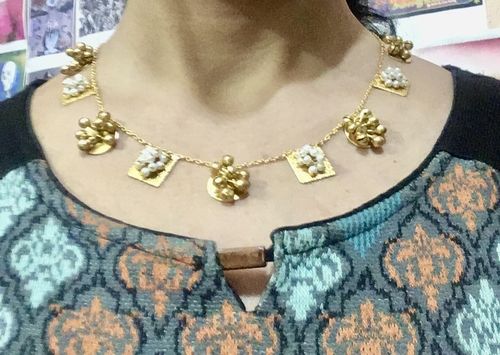 Customer photo review of Rubans 24 K Gold Plated Handcrafted Necklace Set With Pearls And Golden Beads.