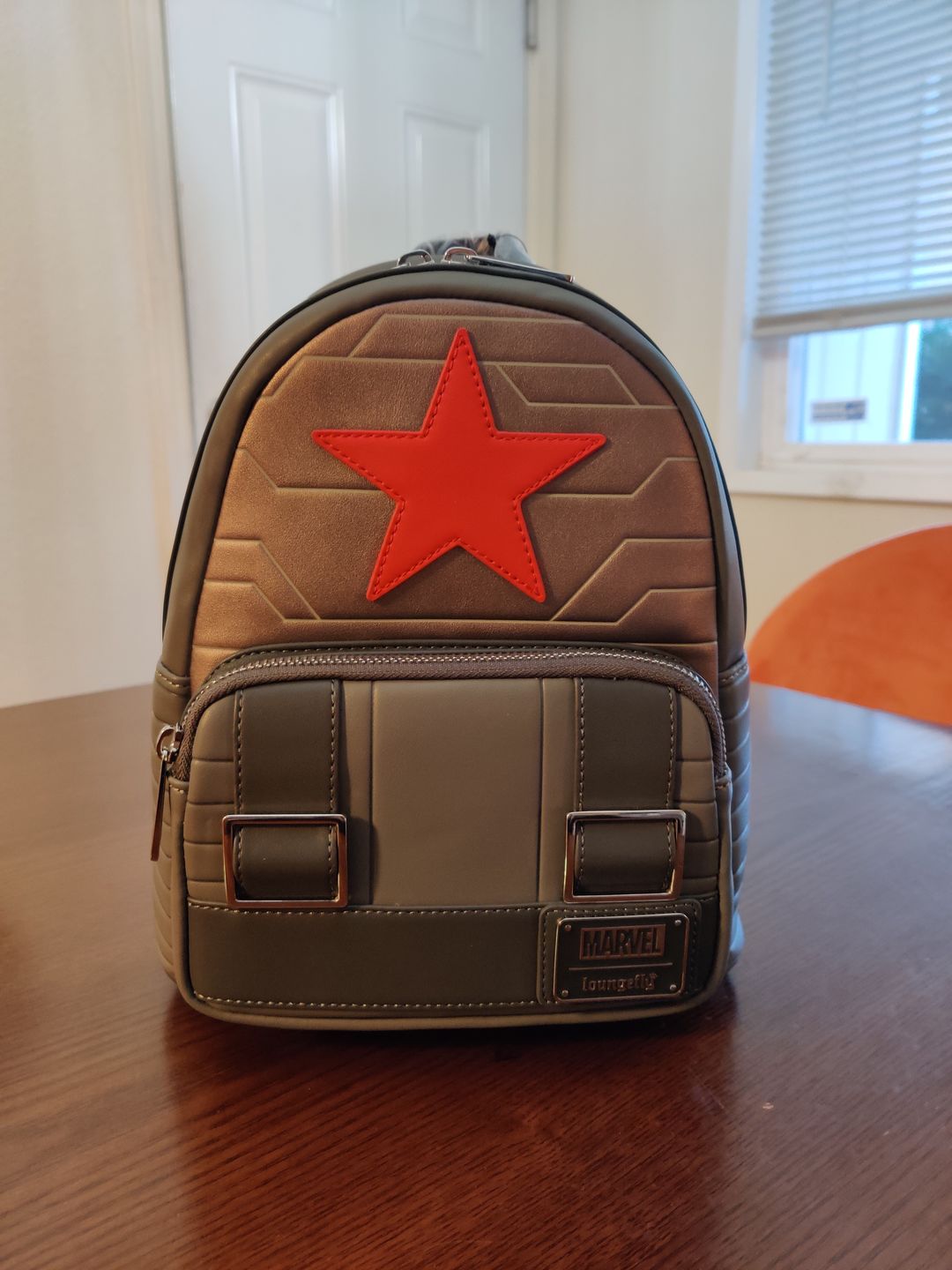 Customer photo review of Loungefly Marvel Winter Soldier Cosplay Mini Backpack