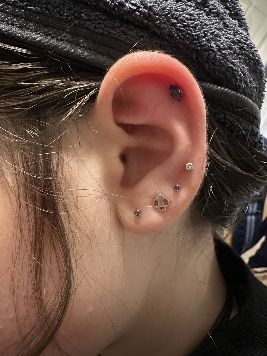 Customer photo review of Cat Skull Silhouette Nose Stud + Earring