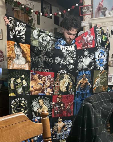 T-shirt quilt with wrestling, sports entertainment themes by Kathy from IL