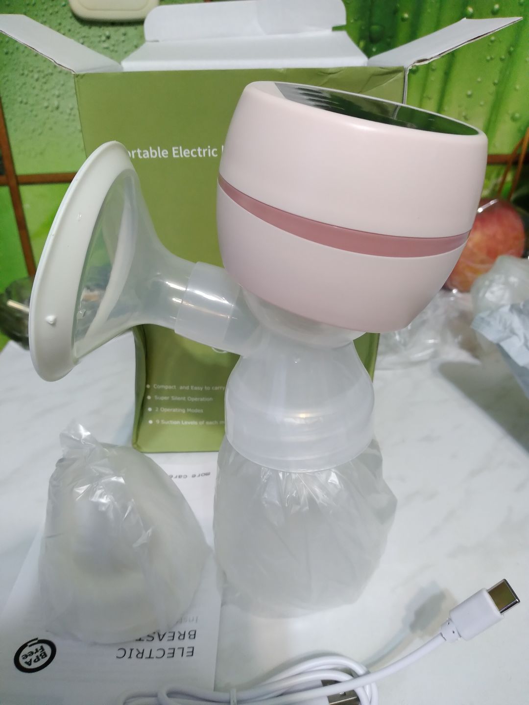 Customer photo review of Tire Lait électrique