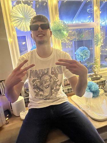 Customer photo review of WINNER TEE