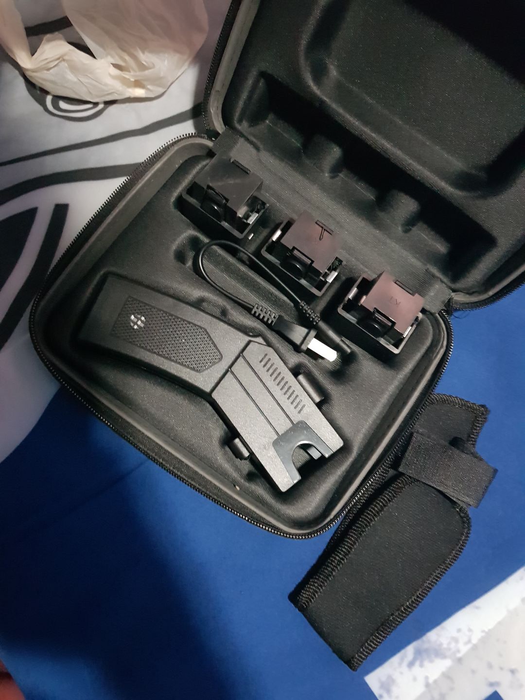 Customer photo review of Pistola Taser Paralizador 3 Cartuchos Funda P/ Cinto Descargador