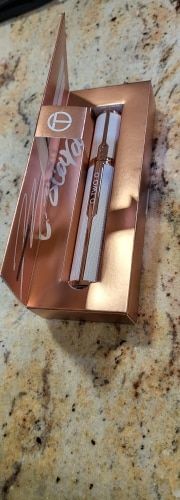 Customer photo review of O.TWO.O Gold Silk Satin Mascara