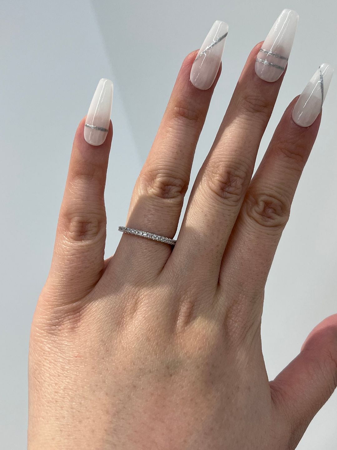 Customer photo review of Louily 0.5 Ct Round Cut Classic Full Eternity Thin Wedding Band For Women In Sterling Silver