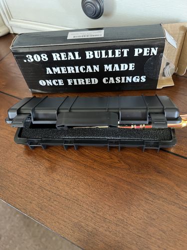 Customer photo review of .308 Real Bullet Authentic Brass Casing Refillable Twist Pen - Tactical Gift Box - Polished Brass