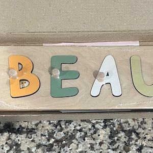 Customer photo review of Boy Dinosaur Name Puzzle