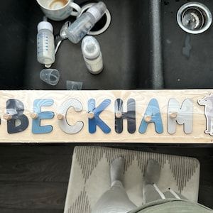 Customer photo review of Boy Dinosaur Name Puzzle