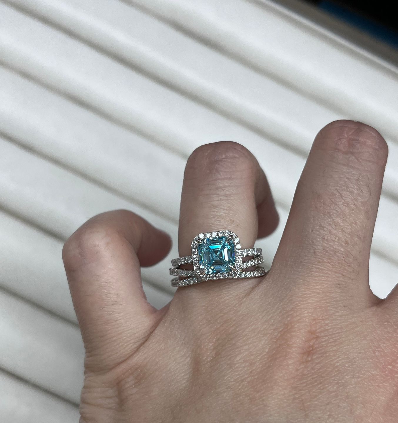 Customer photo review of Louily 2 Ct Exclusive Halo Asscher Cut Light Aquamarine Blue Engagement Ring