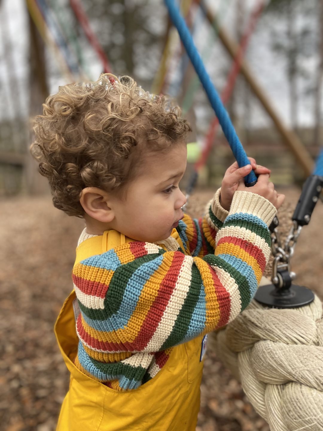Customer photo review of From One To Another Rainbow Striped Snuggly Knitted Jumper