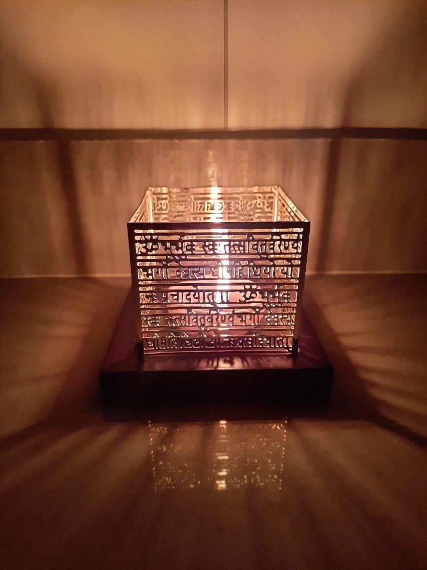 Customer photo review of Gayatri Mantra Tea Light Holder - Teak & Brass