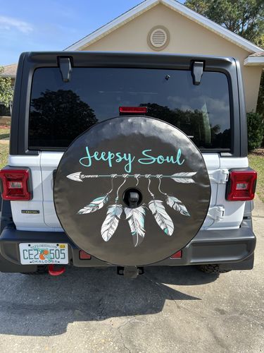 Customer photo review of Jeepsy Soul Boho Feather + Arrow Spare Tire Cover for Jeep