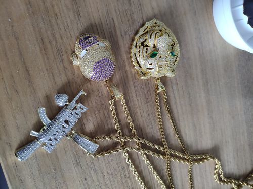 Customer photo review of 18K Gold Icy Emerald Eye Tiger