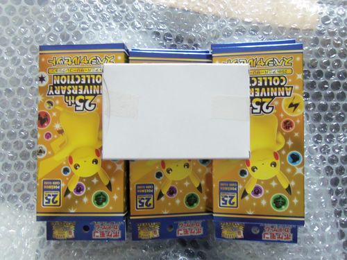Customer photo review of Booster Pokémon Épée et Bouclier S8a Special Pack (4Pack +1Promo Pack)