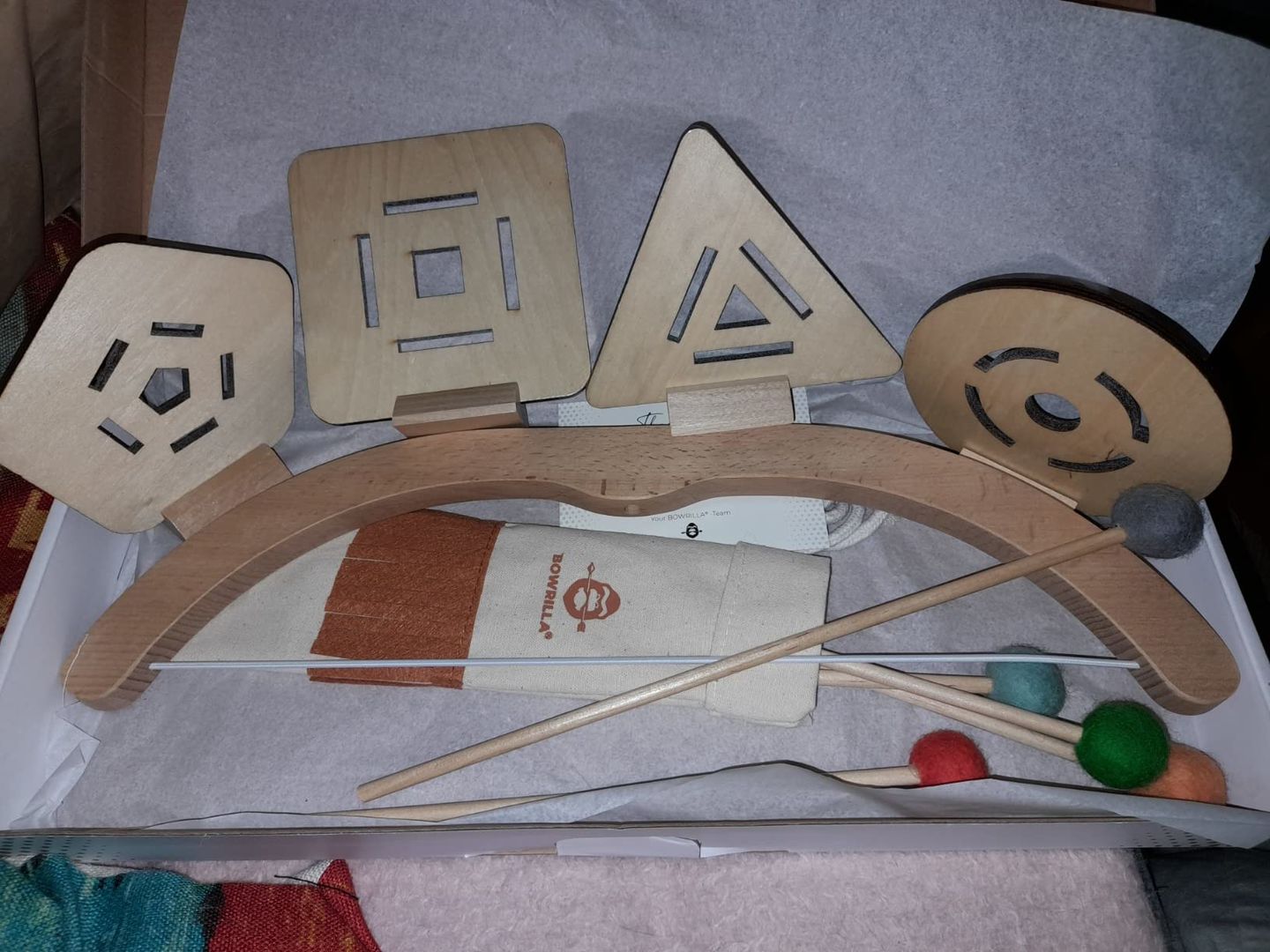 Customer photo review of Pfeil und Bogen Kinder Holzspielzeug mit 5 Pfeilen, Köcher und 3 Zielscheiben