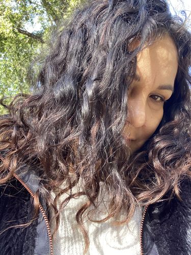 Customer photo review of Rose Bomb Leave-in Conditioning Spray