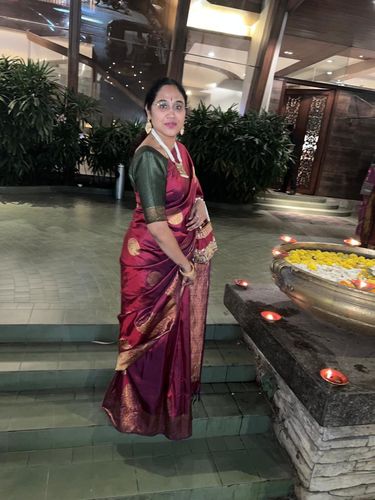 Customer photo review of Rubans Maroon Coloured Potli Handbag With Silver Embroidery And Pearls