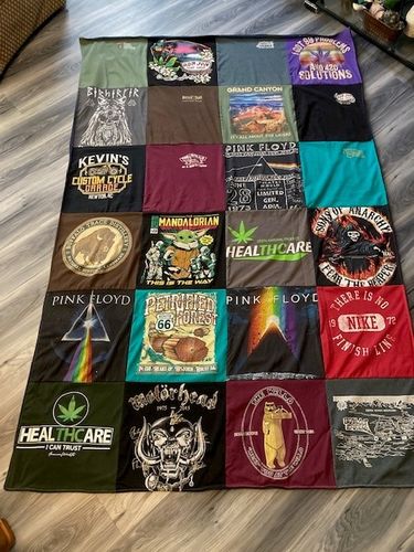 T-shirt quilt with music, healthcare themes by Janis from NC
