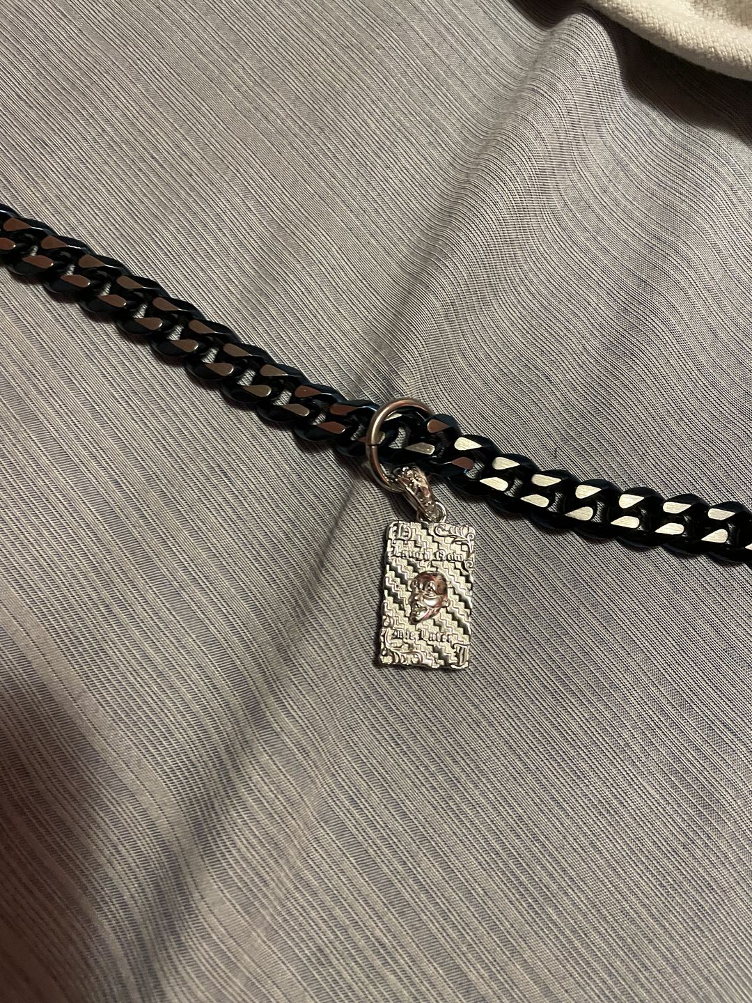 Customer photo review of LAUGH NOW, DIE LATER PENDANT