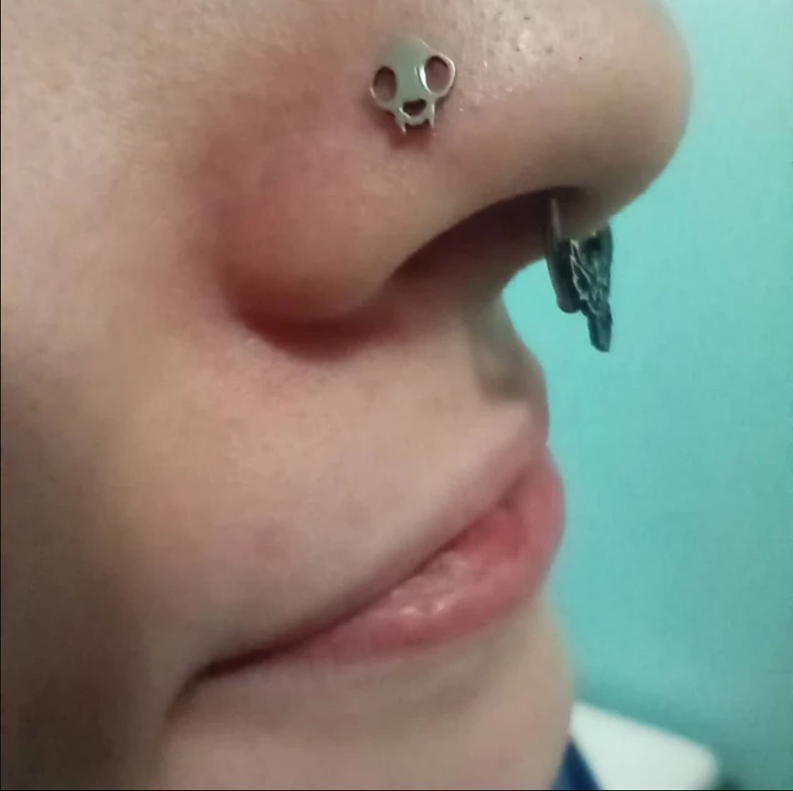 Customer photo review of Cat Skull Silhouette Nose Stud + Earring