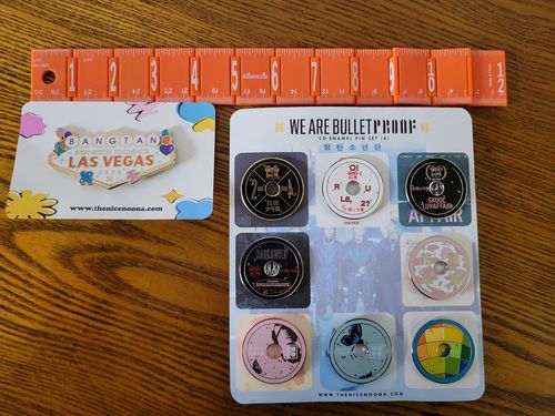 Customer photo review of BTS CD Enamel Pins