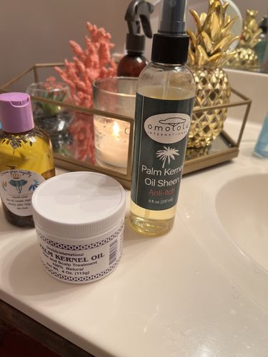 Customer photo review of Omololu Palm Kernel Oil Sheen Anti-Itch - 8oz.