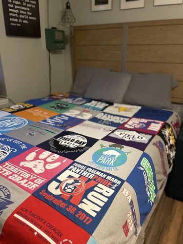 T-shirt quilt with running, outdoor activities themes by Debra from TN