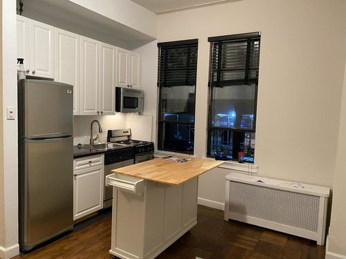 Customer photo review of Kitchen Island Rolling Mobile Island with Wooden Countertop for Kitchen White