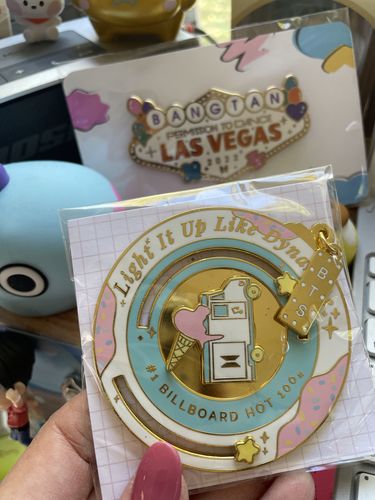 Customer photo review of BTS Dynamite Spinner Enamel Pins