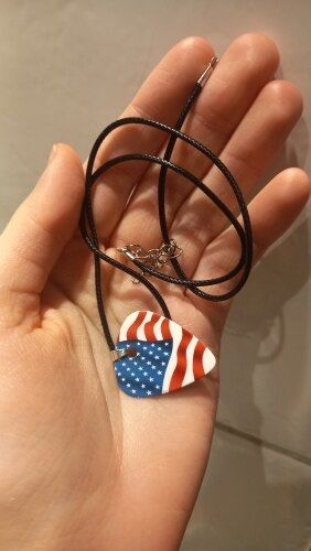 Customer photo review of Unique Guitar pick necklace