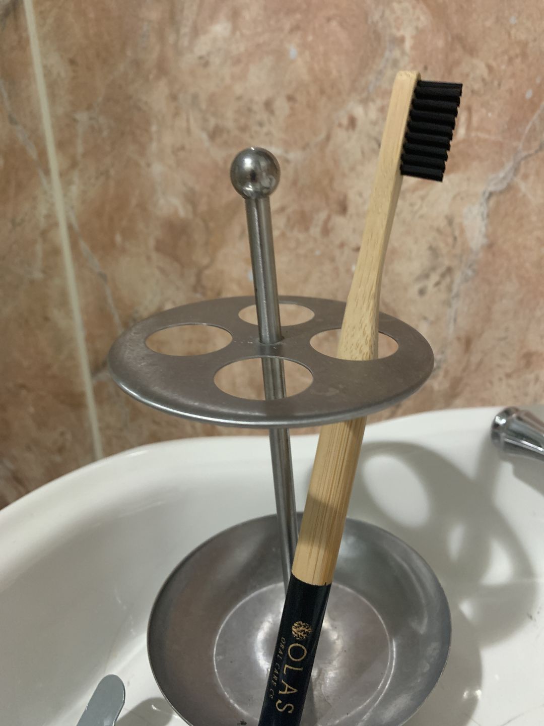 Customer photo review of OLAS Toothbrush Charcoal - Black Handle