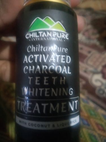 Customer photo review of Activated Charcoal Teeth 🦷 Whitening Treatment - Whitens Teeth Naturally, Kills Cavity causing Bacteria & Eliminates Bad Breath